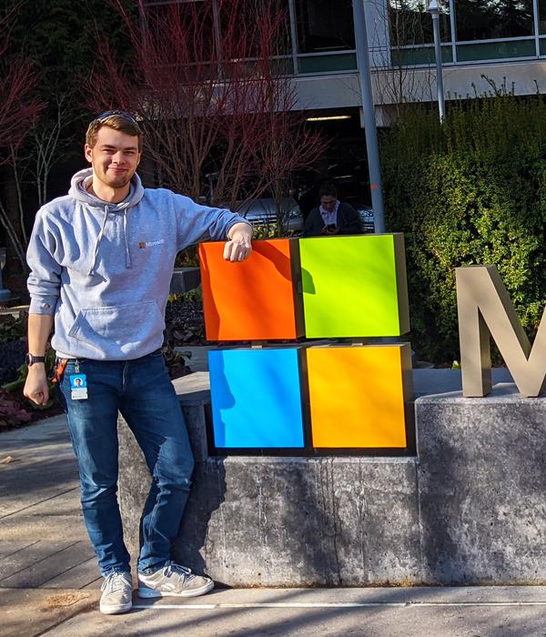 A picture of Rory Claasen at the Microsoft sign at the Microsoft HQ in Redmond